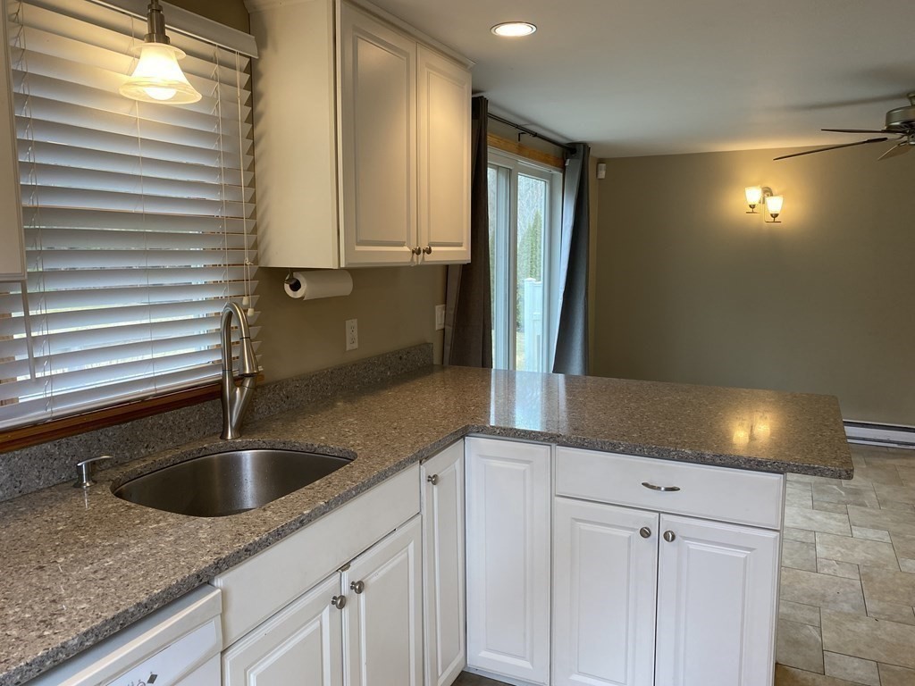 66 Scituate Road Mashpee, MA 02649 - Photo 11 of 33 a kitchen with sink and cabinets
