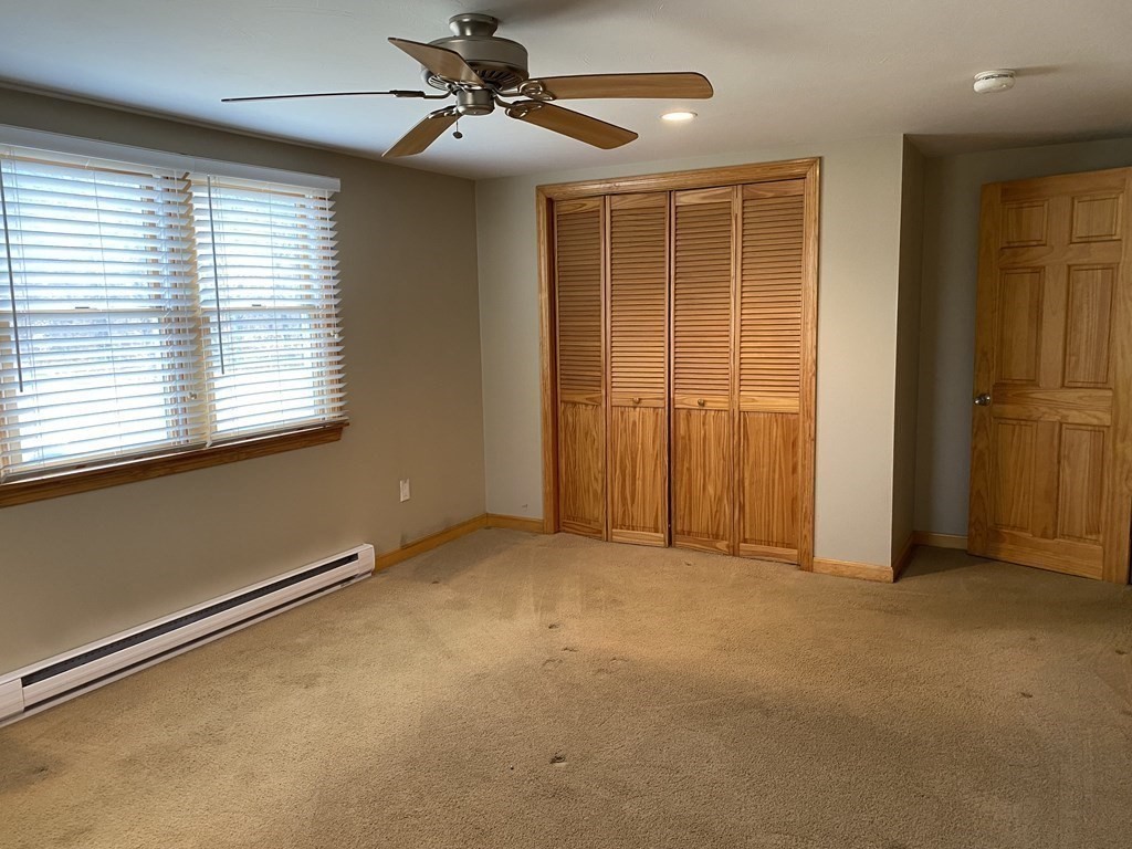 66 Scituate Road Mashpee, MA 02649 - Photo 17 of 33 a view of an empty room with a window