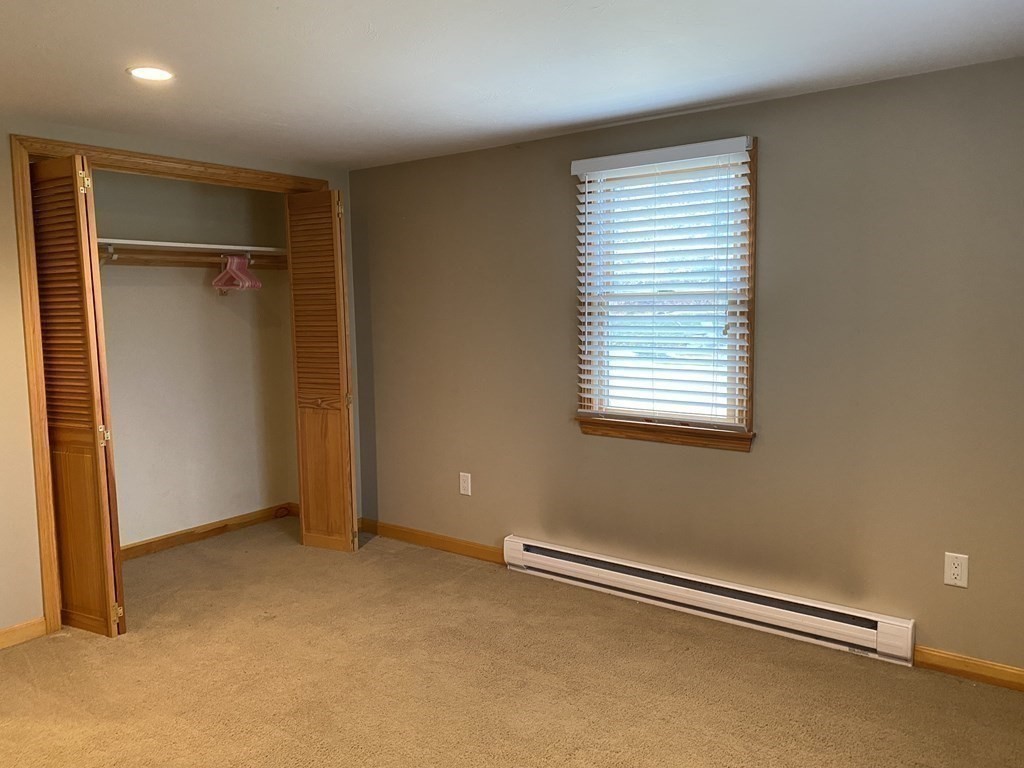 66 Scituate Road Mashpee, MA 02649 - Photo 19 of 33 a view of an empty room with a window