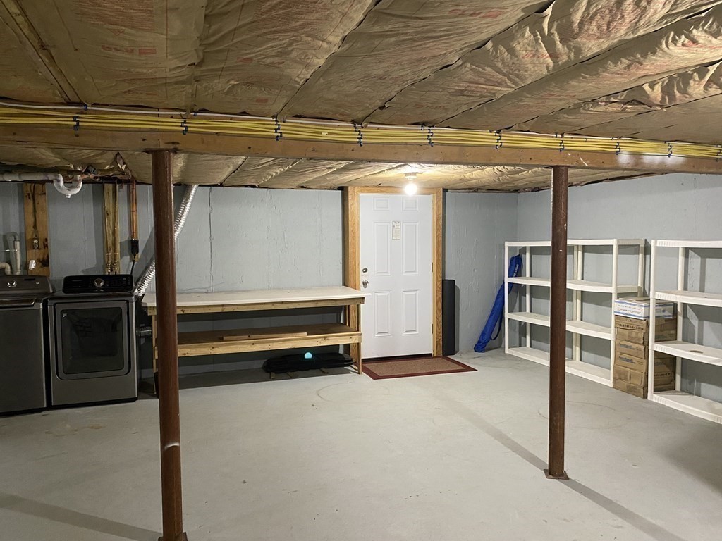 66 Scituate Road Mashpee, MA 02649 - Photo 22 of 33 a view of a room with racks