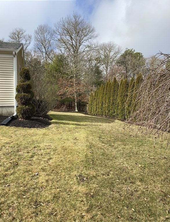 66 Scituate Road Mashpee, MA 02649 - Photo 27 of 33 a view of swimming pool with an outdoor space