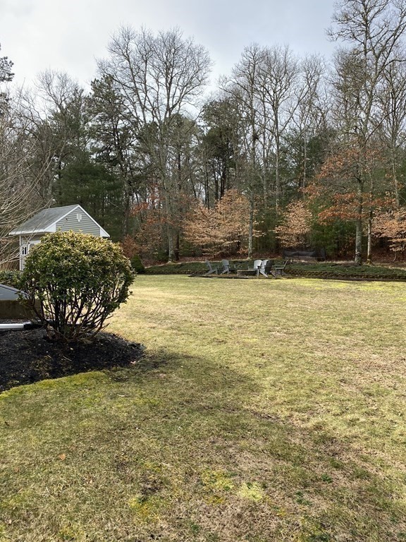 66 Scituate Road Mashpee, MA 02649 - Photo 28 of 33 a view of swimming pool with an outdoor space