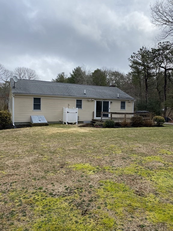 66 Scituate Road Mashpee, MA 02649 - Photo 31 of 33 a front view of house with yard