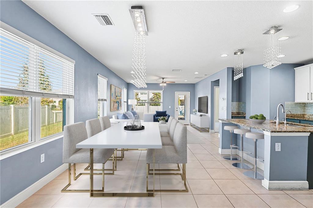 1848 Oak Hammock Court Lutz, FL 33558 - Photo 2 of 25 a view of a dining room with furniture window and outside view