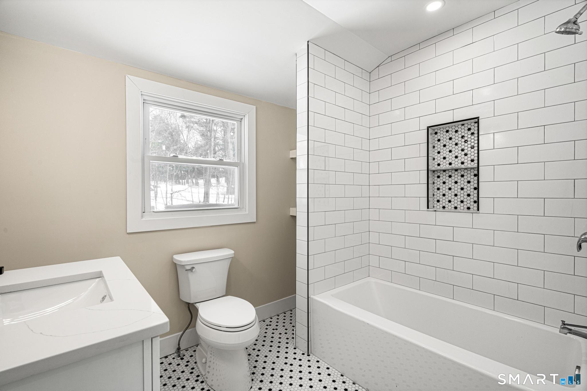 6 Juniper Ridge Drive Danbury, CT 06811 - Photo 32 of 36 a bathroom with a toilet and a bathtub