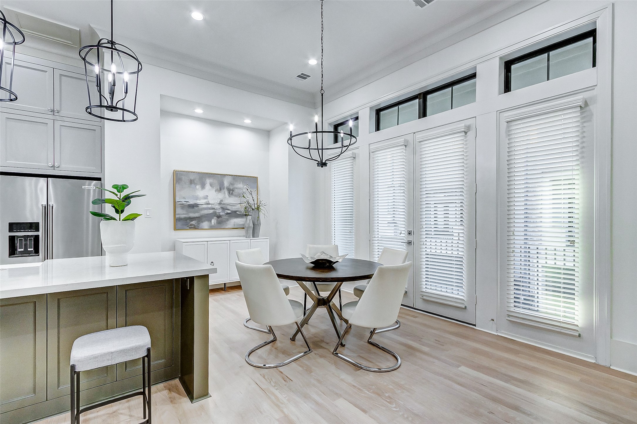 2122 Blalock Road, Unit B Houston, TX 77080 - Photo 19 of 48 a room with chandelier fan and windows