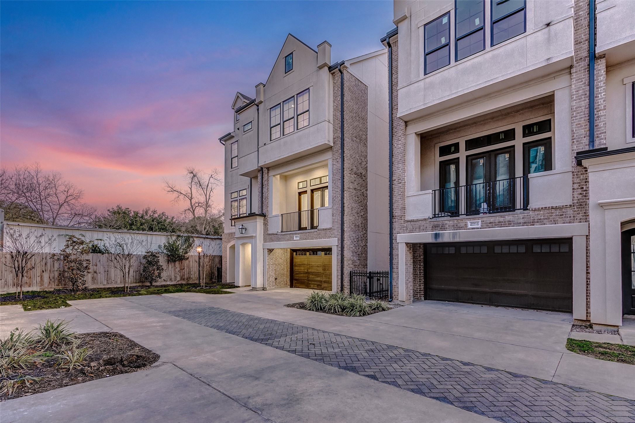 2122 Blalock Road, Unit B Houston, TX 77080 - Photo 2 of 48 a front view of a house with a yard and garage