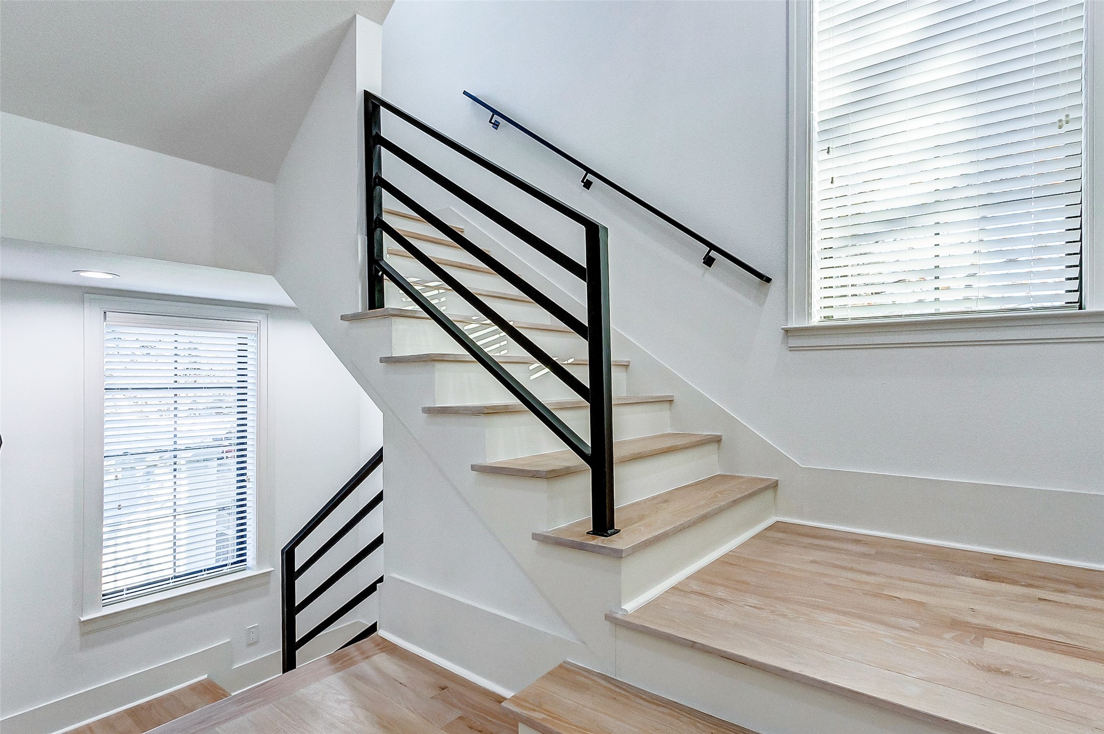 2122 Blalock Road, Unit B Houston, TX 77080 - Photo 27 of 48 a view of entryway with wooden floor and stairs