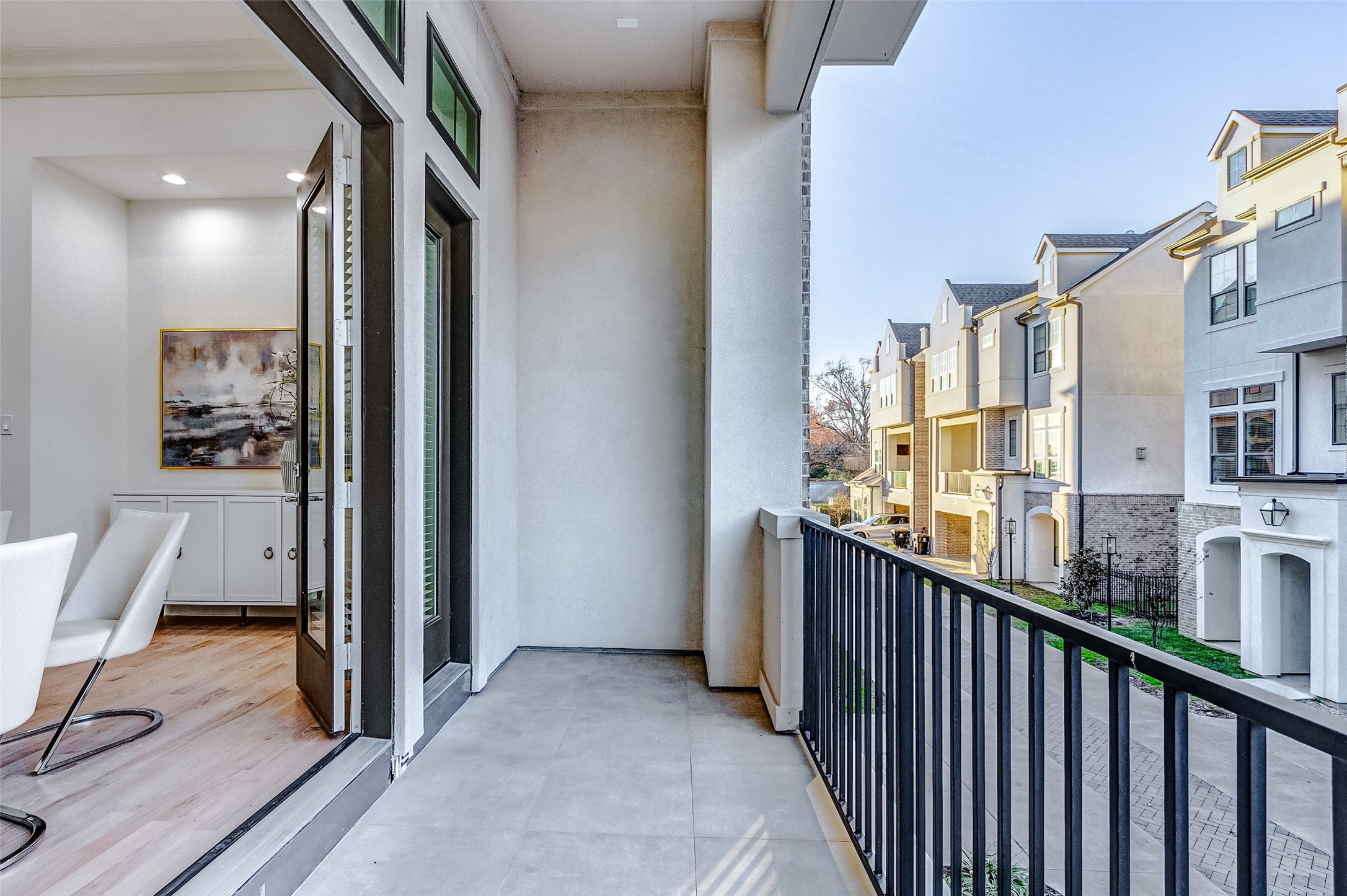2122 Blalock Road, Unit B Houston, TX 77080 - Photo 43 of 48 a view of a balcony with furniture and floor to ceiling window