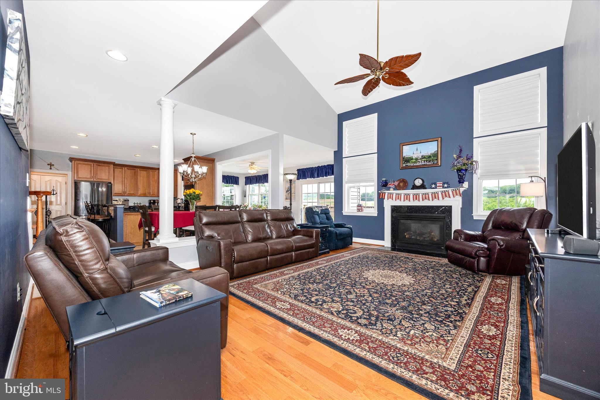 9855 McKinstry Mill Road New Windsor, MD 21776 - Photo 21 of 76 a living room with furniture and a fireplace