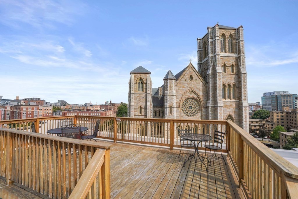 1411 Washington Street, Unit 5 Boston, MA 02118 - Photo 15 of 19 a view of a balcony with wooden floor