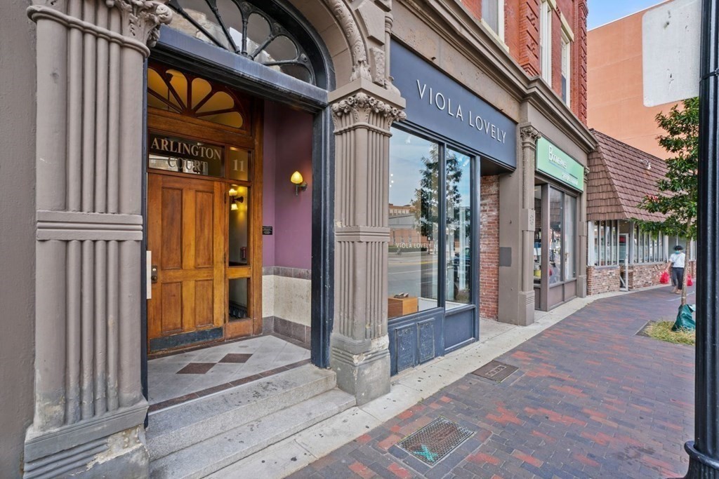1411 Washington Street, Unit 5 Boston, MA 02118 - Photo 18 of 19 a view of a brick building with a glass door