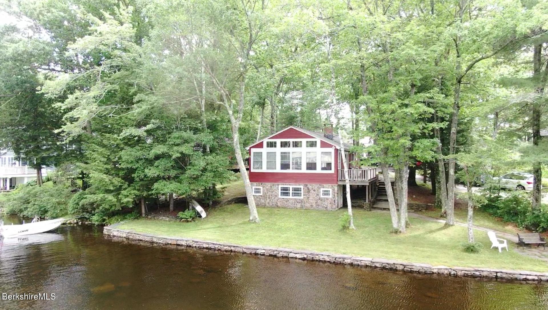 5 South Gate Island Road Otis, MA 01029 - Photo 1 of 38 a view of a house with a yard balcony