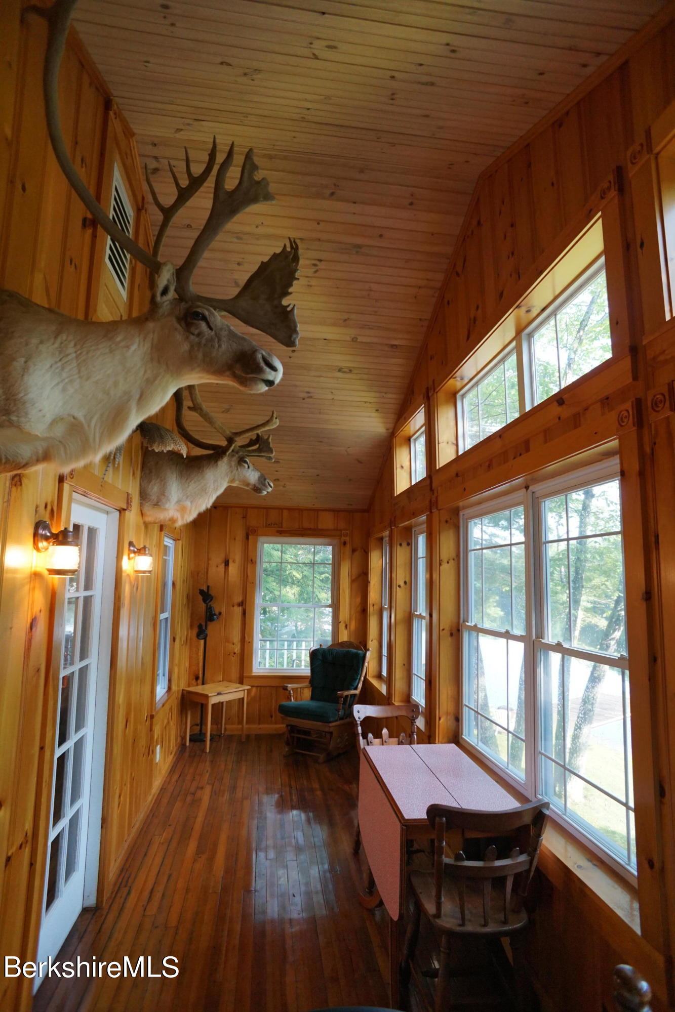 5 South Gate Island Road Otis, MA 01029 - Photo 11 of 38 a outdoor space with wooden floor and furniture
