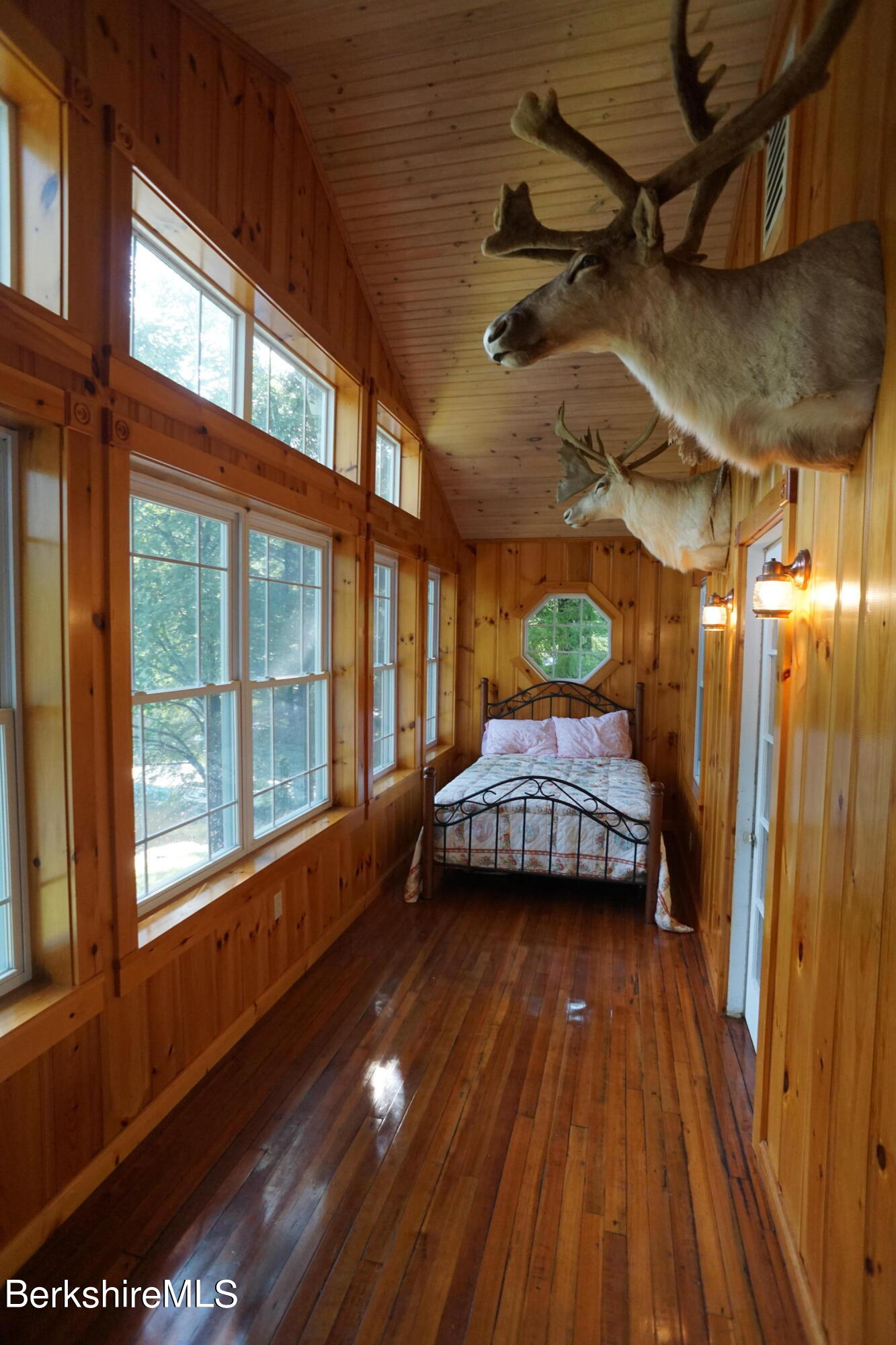 5 South Gate Island Road Otis, MA 01029 - Photo 14 of 38 a view of a room with wooden floor and balcony