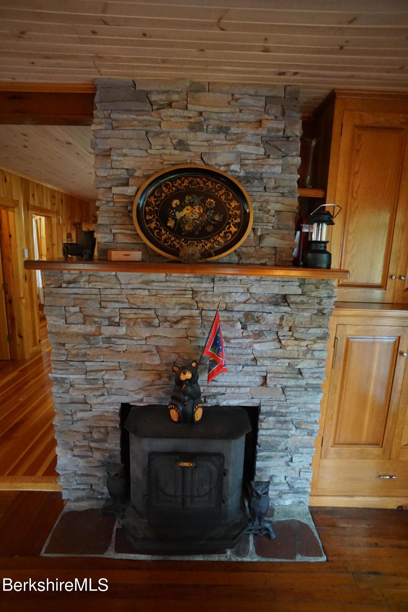 5 South Gate Island Road Otis, MA 01029 - Photo 20 of 38 a living room with fireplace
