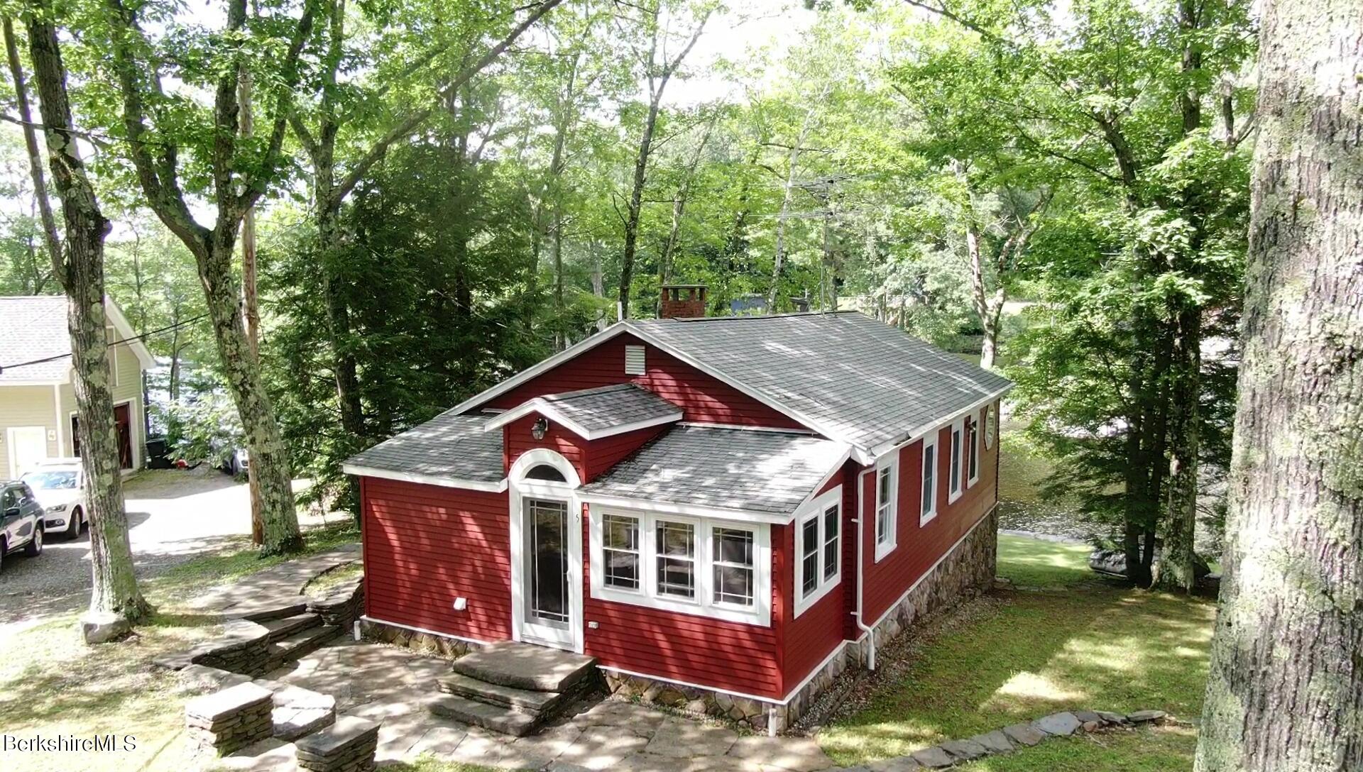 5 South Gate Island Road Otis, MA 01029 - Photo 2 of 38 a aerial view of a house with a yard balcony