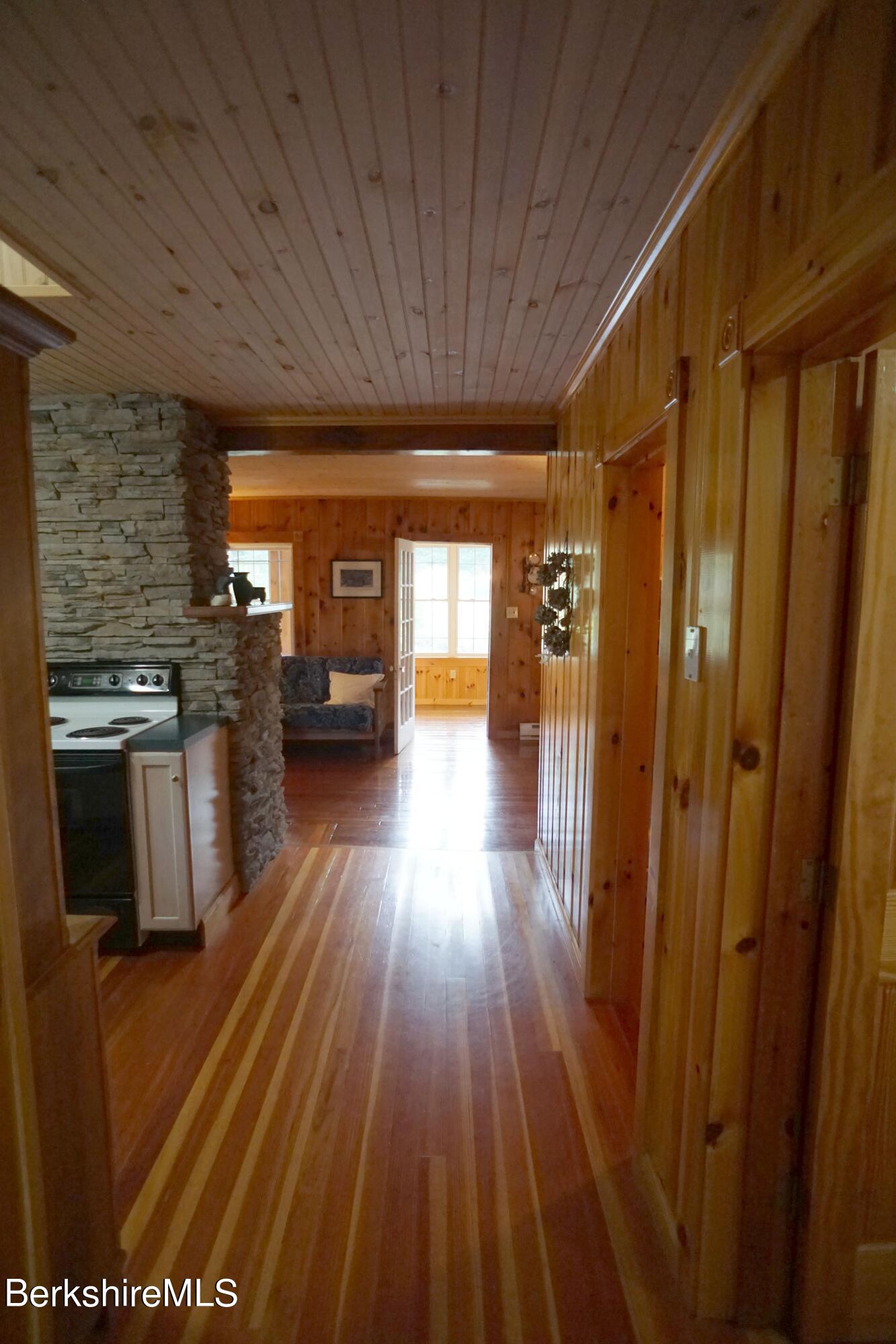 5 South Gate Island Road Otis, MA 01029 - Photo 26 of 38 a view of a hallway with wooden floor