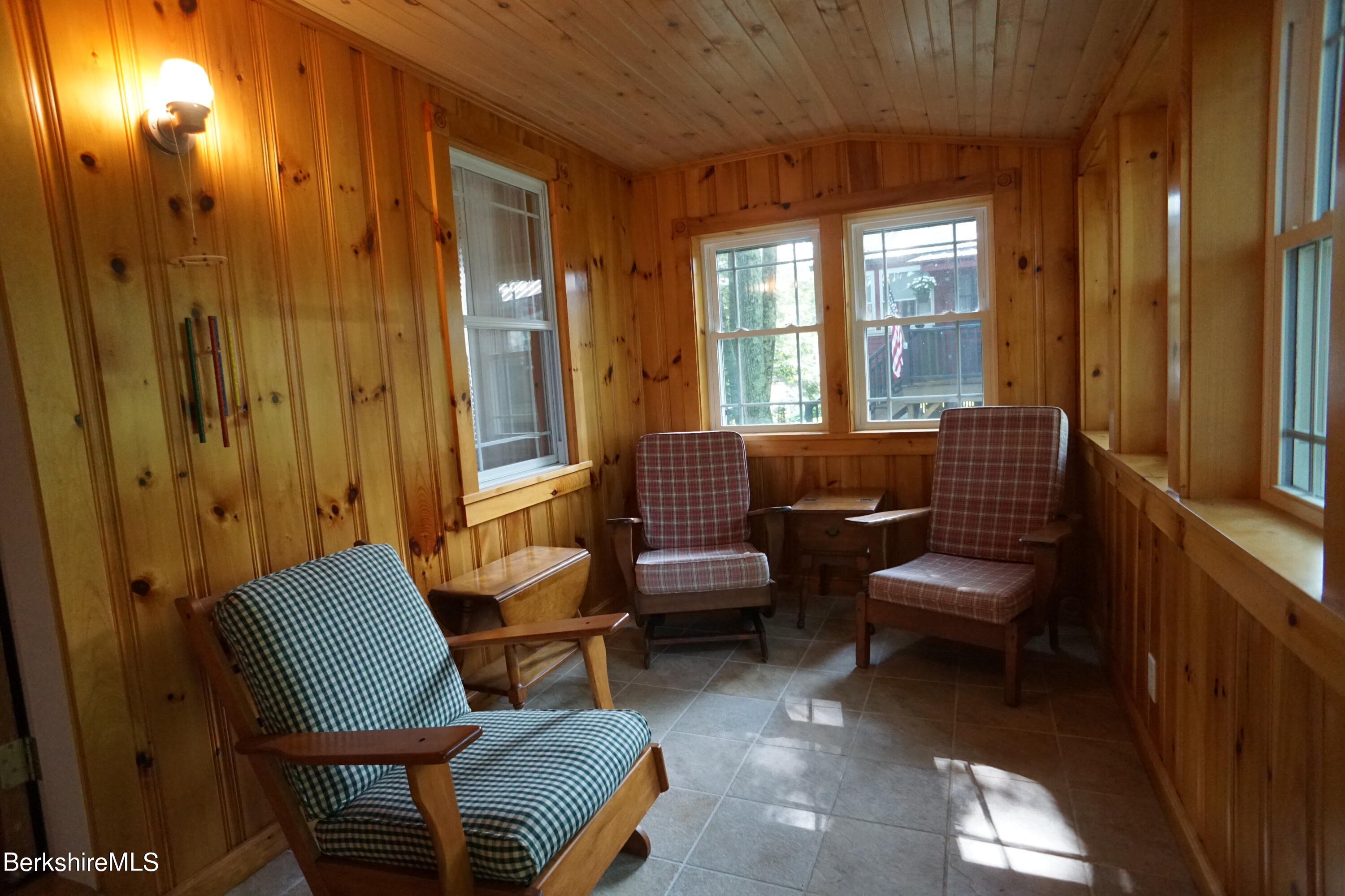 5 South Gate Island Road Otis, MA 01029 - Photo 29 of 38 a living room with furniture and a window