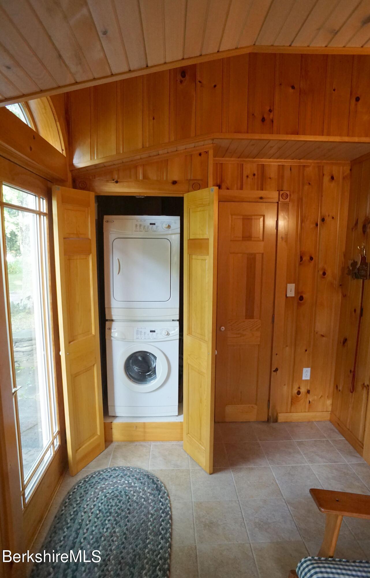 5 South Gate Island Road Otis, MA 01029 - Photo 30 of 38 a bathroom with a tub and shower