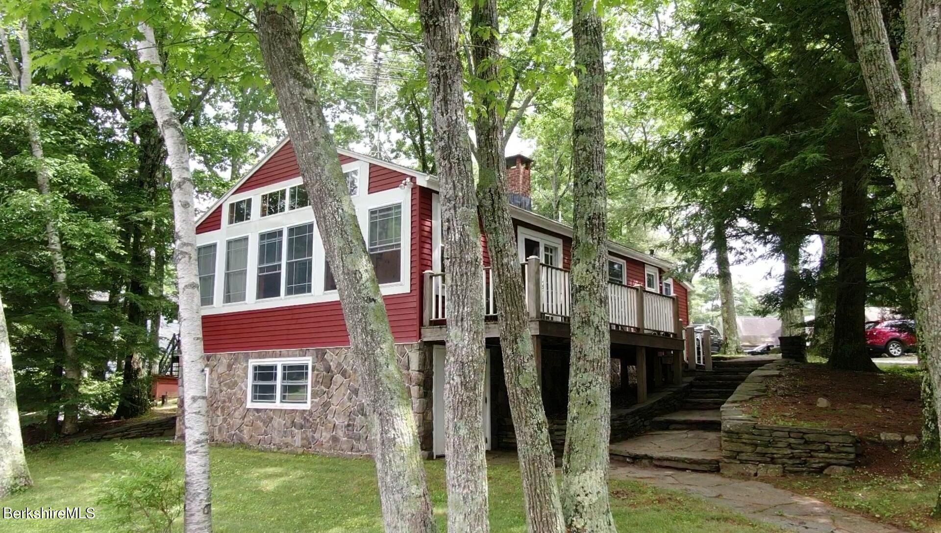 5 South Gate Island Road Otis, MA 01029 - Photo 37 of 38 a front view of a house with a yard