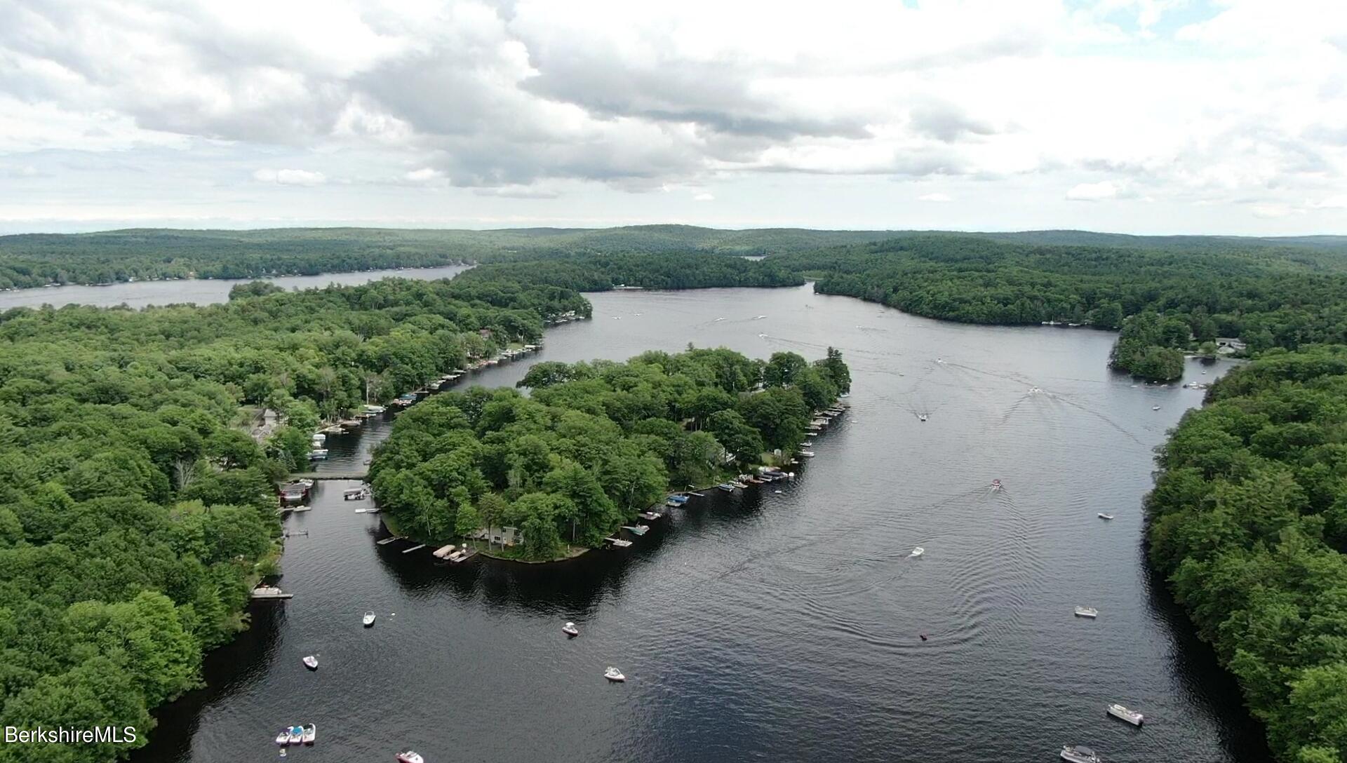 5 South Gate Island Road Otis, MA 01029 - Photo 10 of 38 an aerial view of a house with a yard and lake view in back