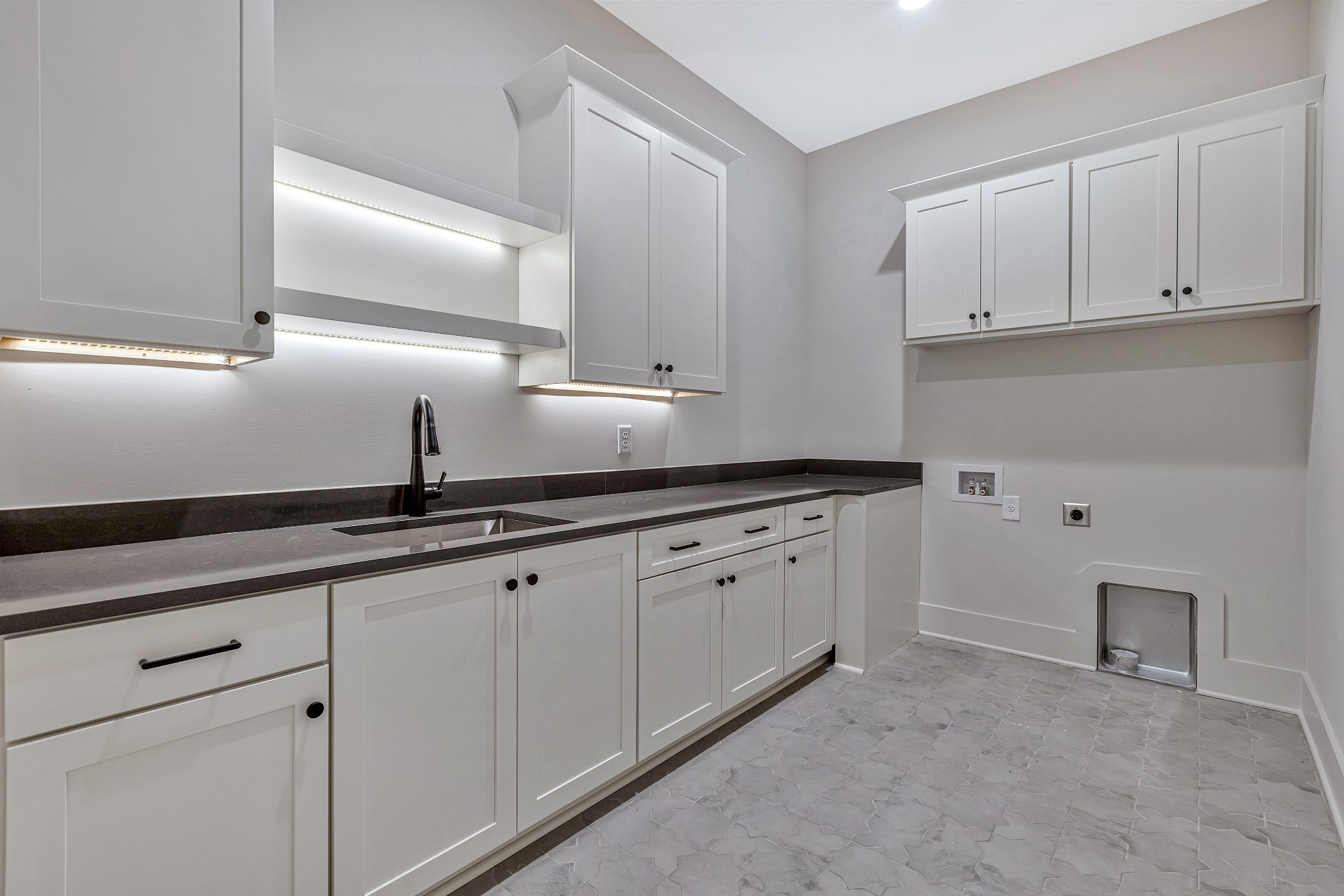 5025 Cobbler Ridge Road Franklin, TN 37064 - Photo 14 of 34 a kitchen with granite countertop white cabinets and a sink