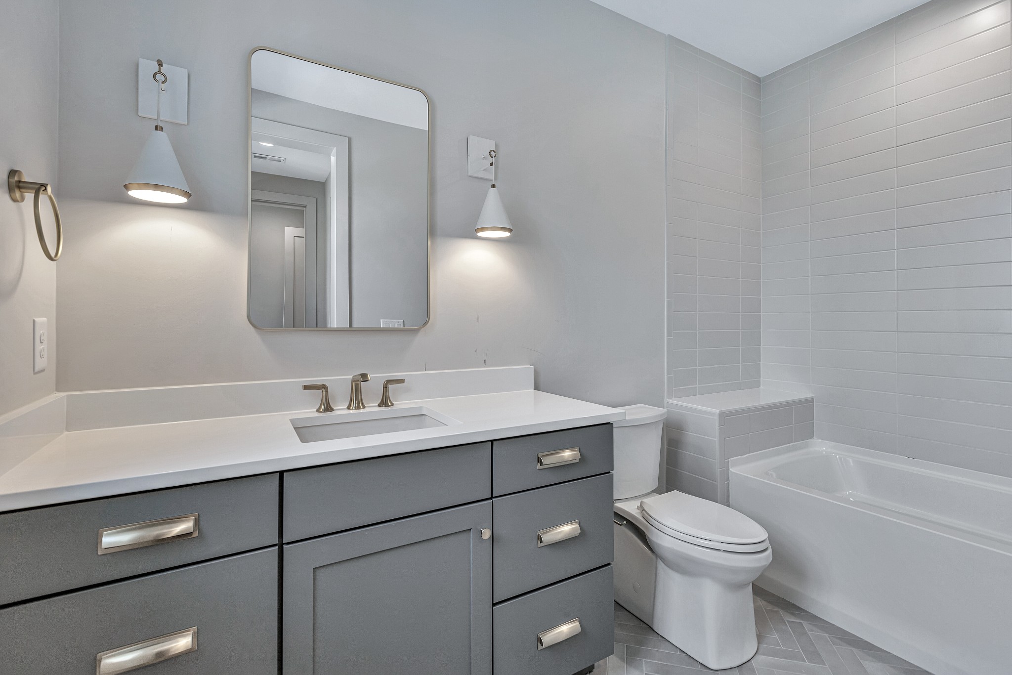 5025 Cobbler Ridge Road Franklin, TN 37064 - Photo 28 of 34 a bathroom with a toilet a sink a tub and mirror