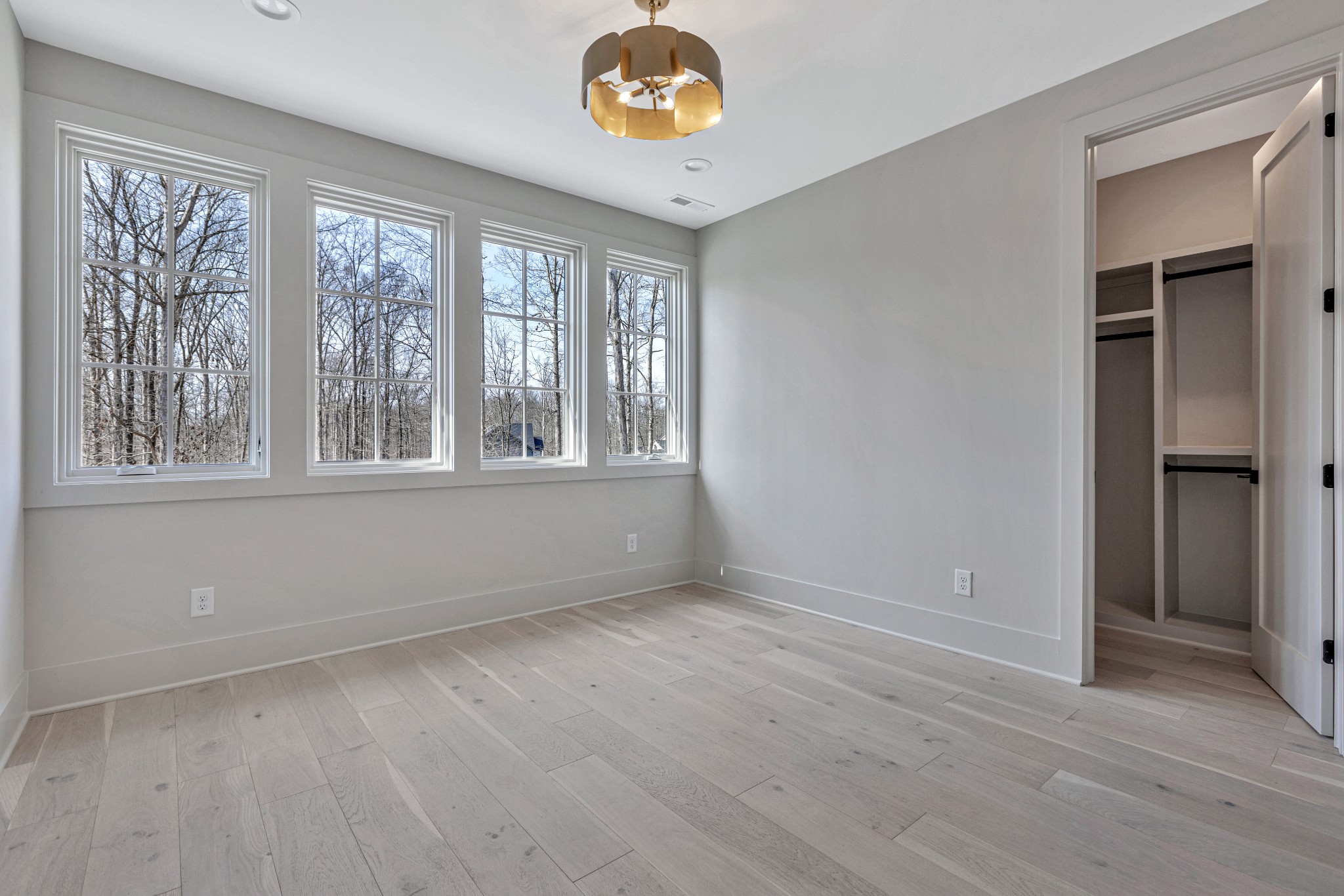 5025 Cobbler Ridge Road Franklin, TN 37064 - Photo 29 of 34 wooden floor in an empty room with a window