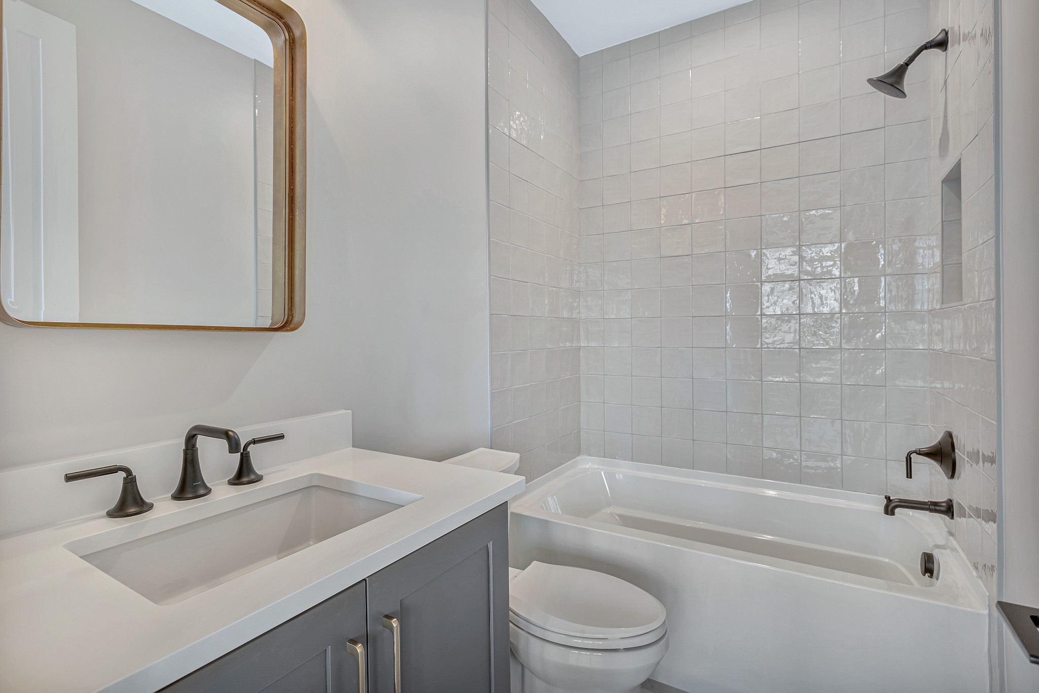 5025 Cobbler Ridge Road Franklin, TN 37064 - Photo 30 of 34 a bathroom with a sink a toilet and bathtub