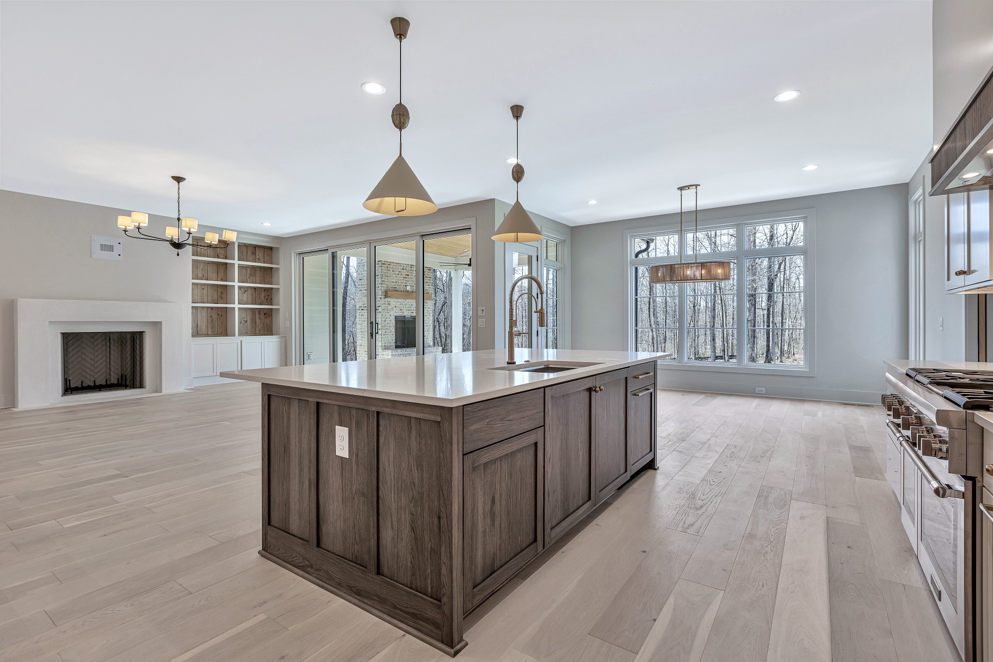 5025 Cobbler Ridge Road Franklin, TN 37064 - Photo 10 of 34 a open kitchen with stainless steel appliances granite countertop a stove and a wooden floors