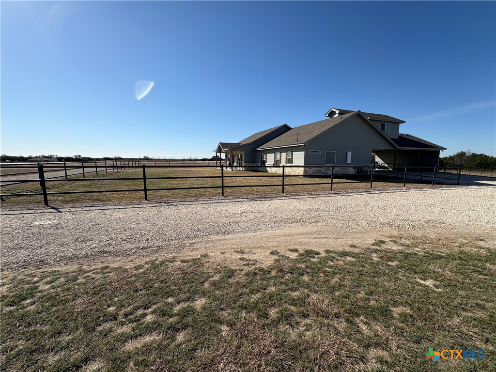 5851 Moccasin Bend Road Gatesville, TX 76528 - Photo 6 of 48 a view of a large house with a yard