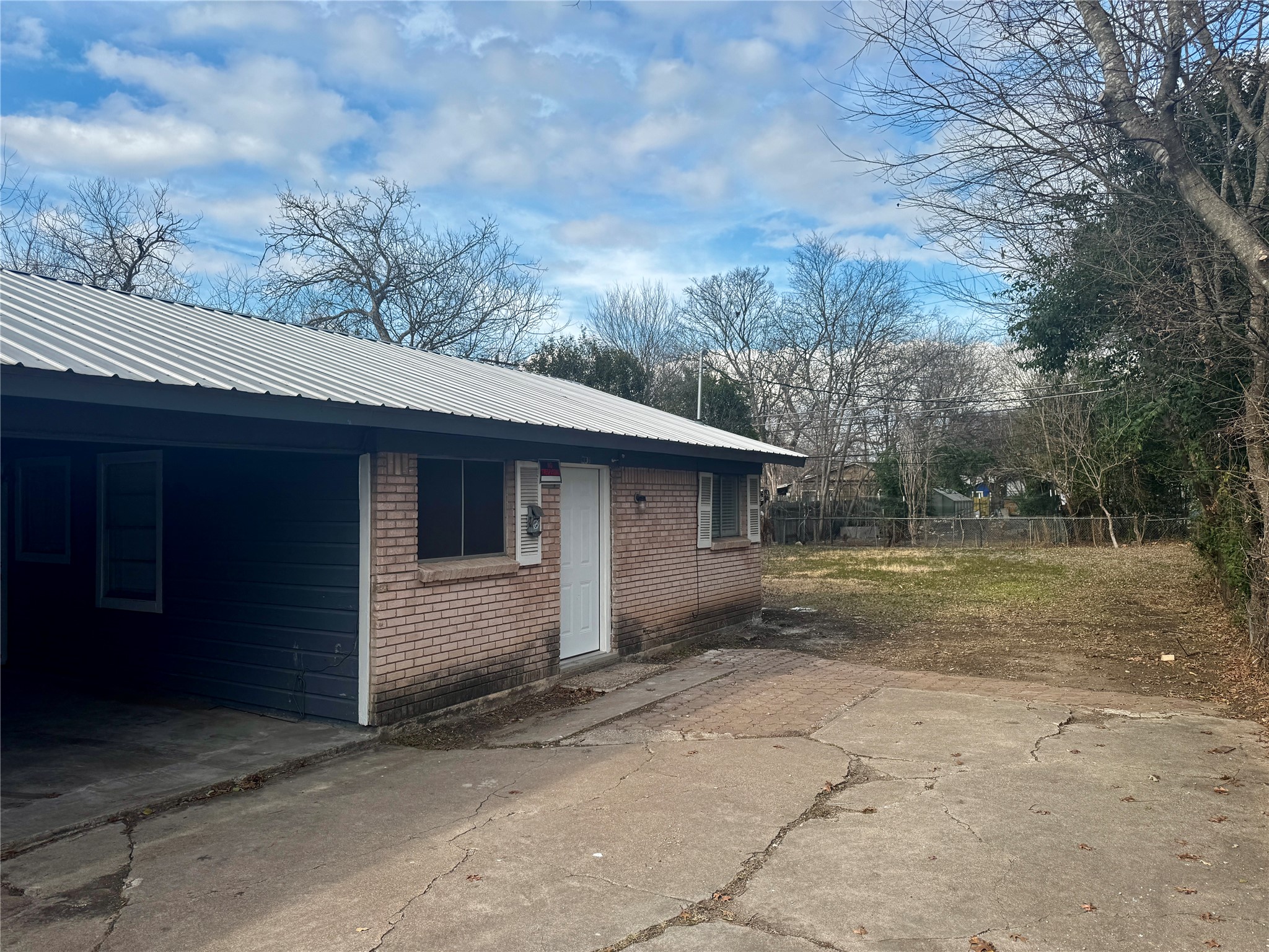 202 West N Loop Boulevard, Unit B Austin, TX 78751 - Photo 1 of 7 a view of a backyard of the house