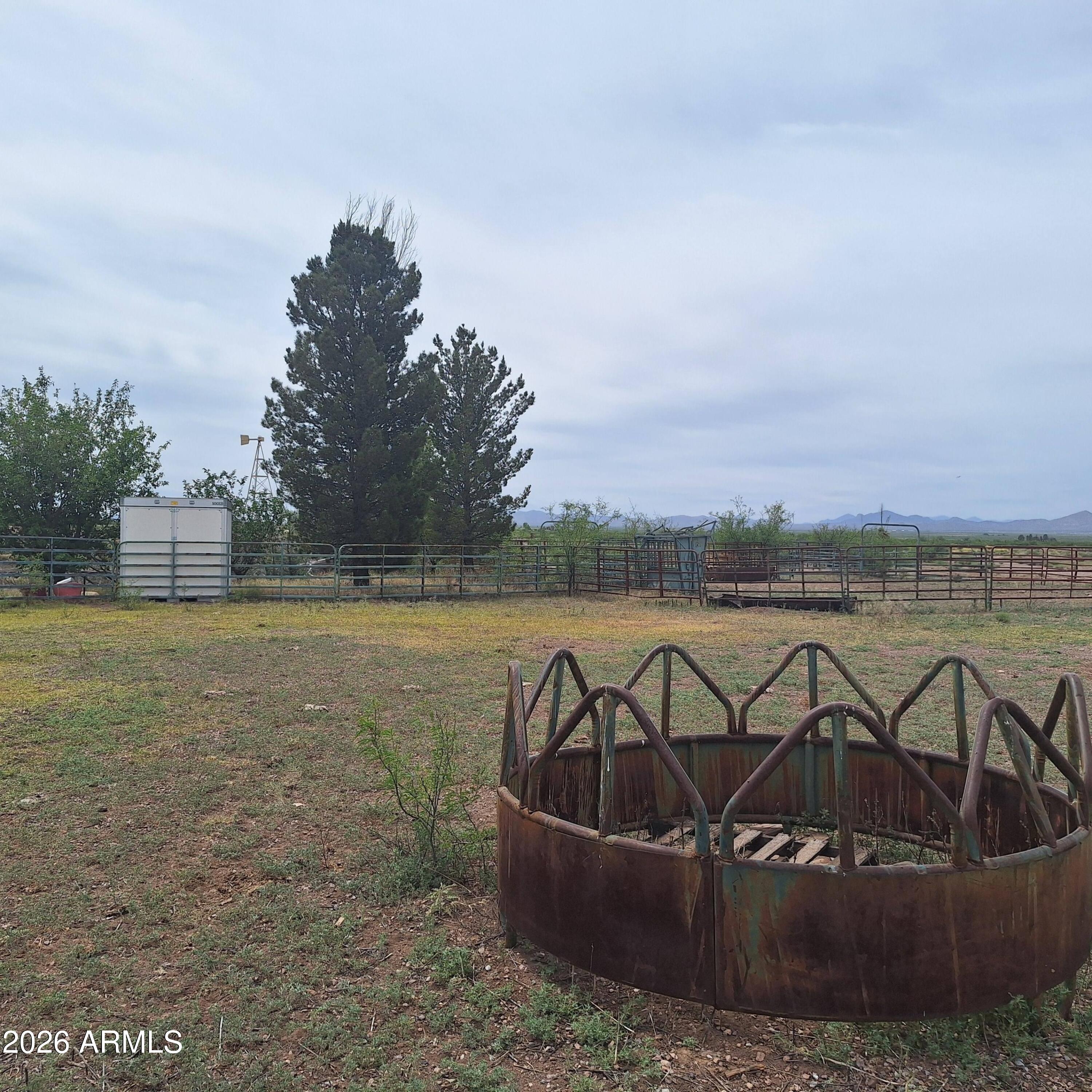 3470 West Double Adobe Road McNeal, AZ 85617 - Photo 13 of 23 a view of a lake with a yard from a lake view