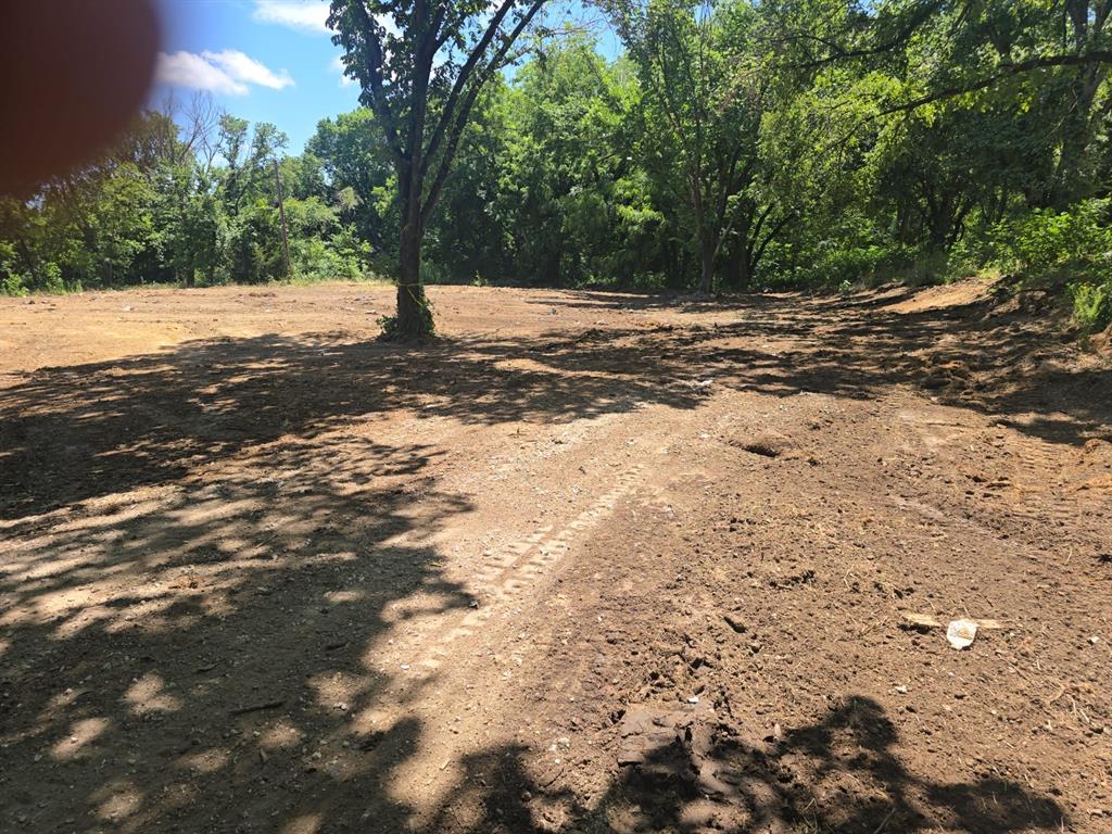 1901 West Bethesda Road Burleson, TX 76028 - Photo 5 of 5 a wooden bench with view of trees