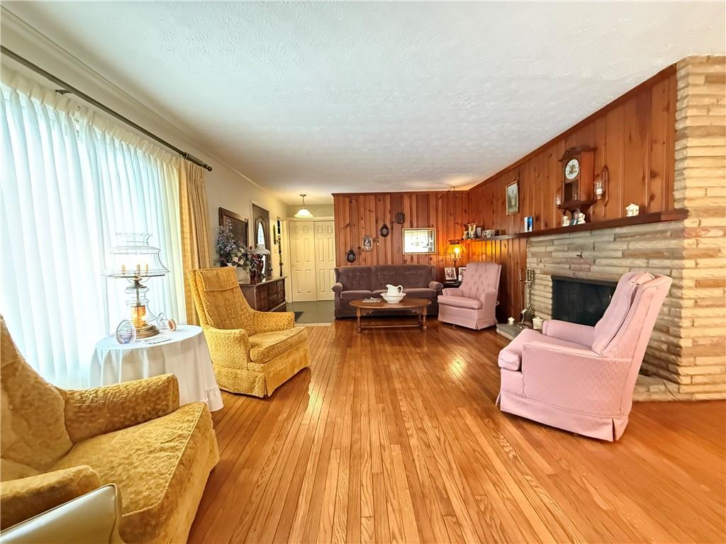 123 Hadley Road Greenville, PA 16125 - Photo 20 of 49 a living room with furniture and a fireplace