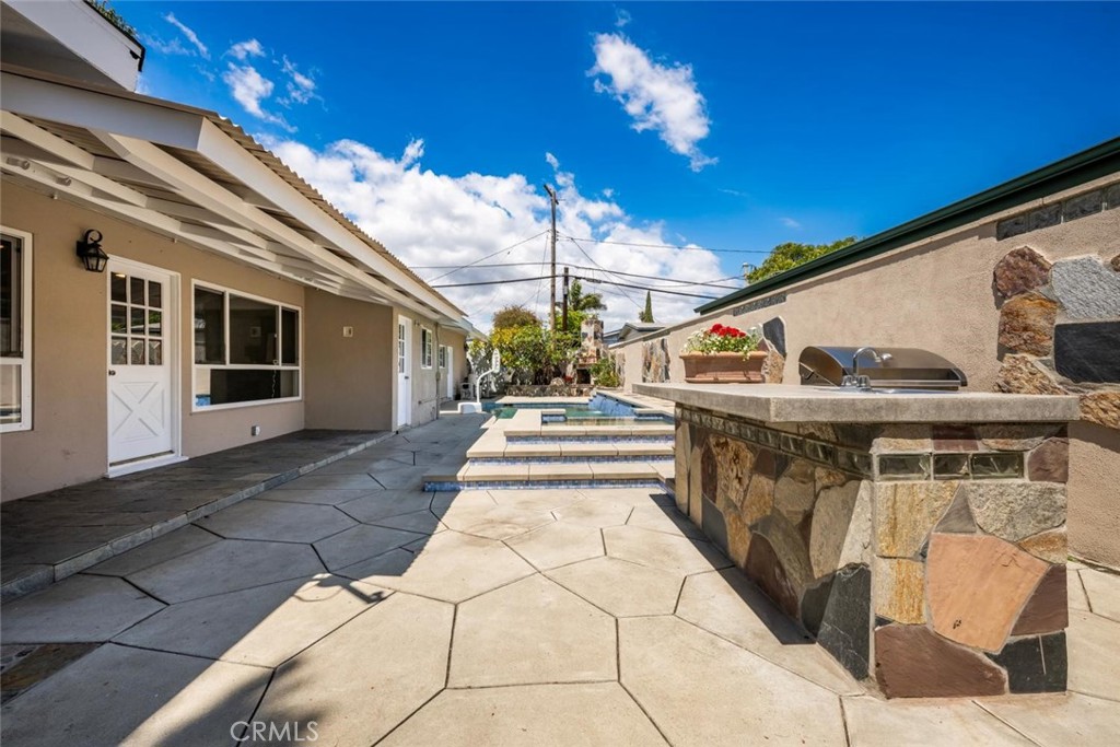1238 North Studebaker Road Long Beach, CA 90815 - Photo 39 of 47 a view of swimming pool with a patio