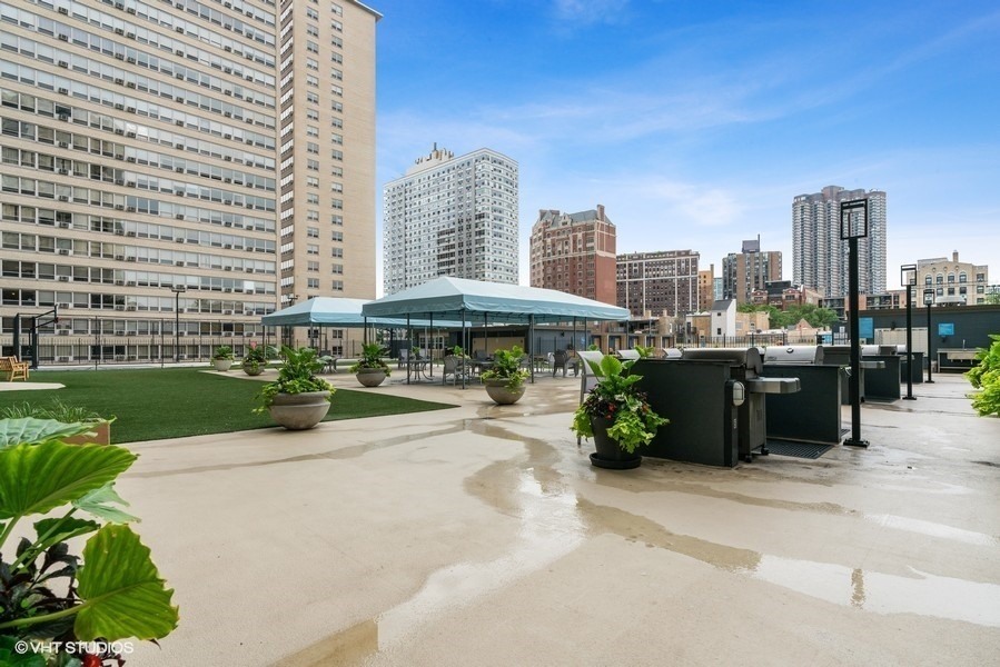 655 West Irving Park Road, Unit 5202 Chicago, IL 60613 - Photo 21 of 26 a view of a city with tall buildings