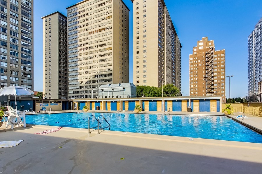 655 West Irving Park Road, Unit 5202 Chicago, IL 60613 - Photo 26 of 26 a view of swimming pool with outdoor seating