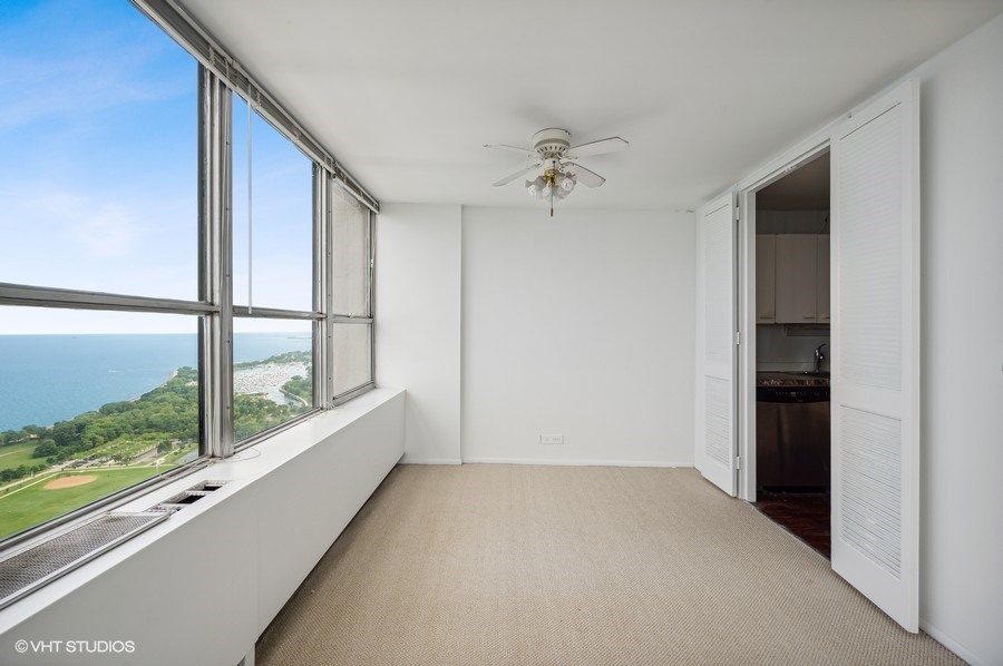655 West Irving Park Road, Unit 5202 Chicago, IL 60613 - Photo 4 of 26 a view of hallway with window