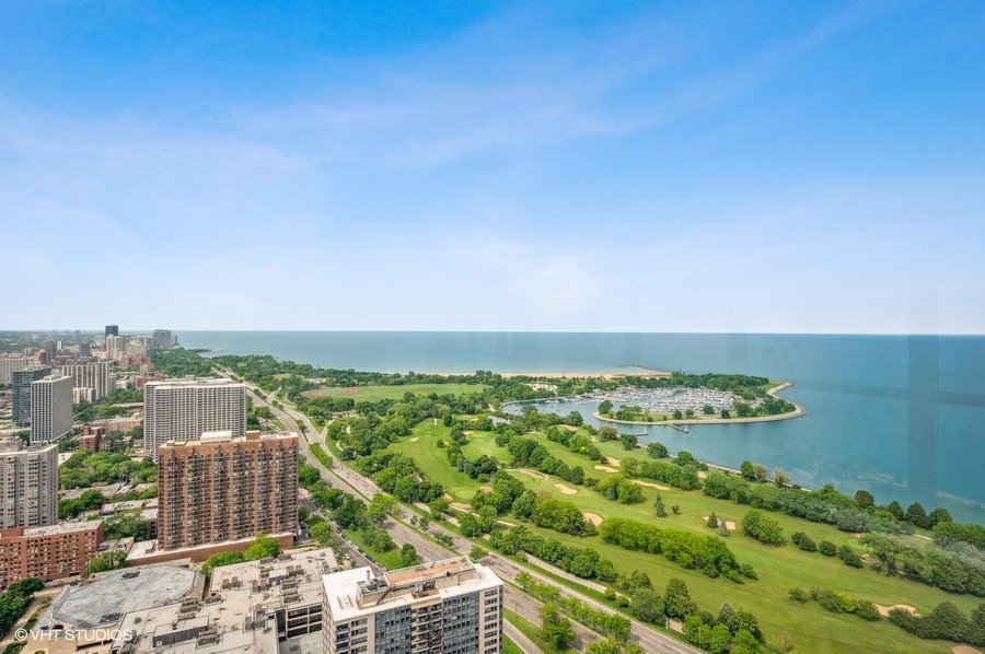 655 West Irving Park Road, Unit 5202 Chicago, IL 60613 - Photo 6 of 26 an aerial view of a house with a yard