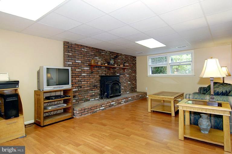 565 Poplar Drive Riva, MD 21140 - Photo 27 of 30 Brick Wood Burning Fireplace