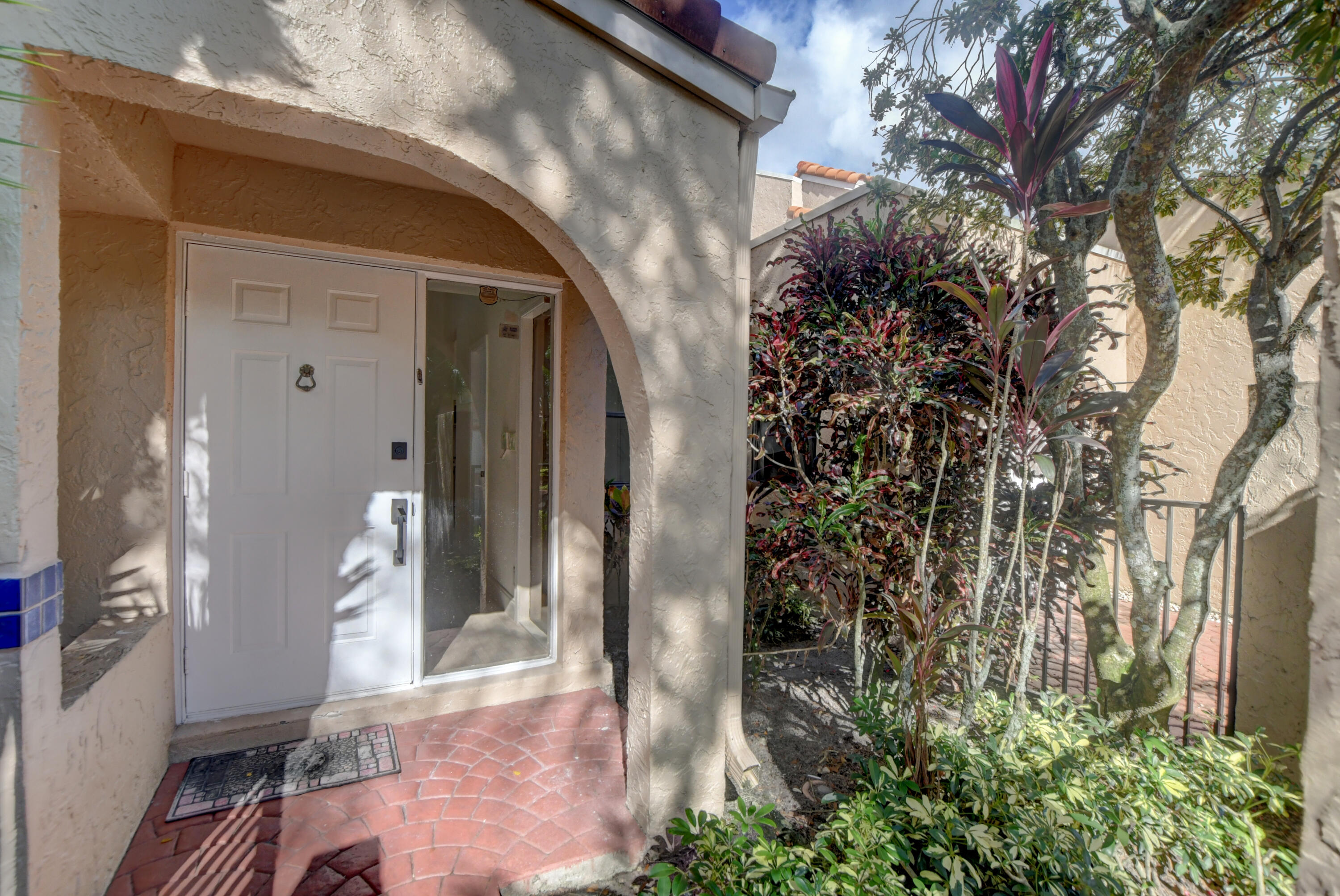22780 Meridiana Drive Boca Raton, FL 33433 - Photo 14 of 63 Front door and side yard