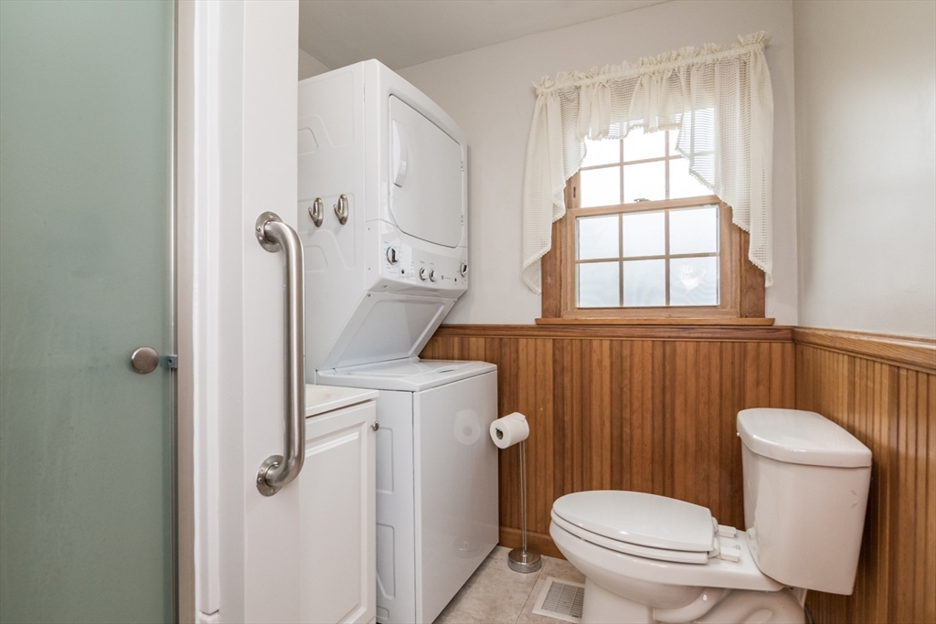 88 Buffam Road Pelham, MA 01002 - Photo 20 of 42 a bathroom with a toilet a sink and a window