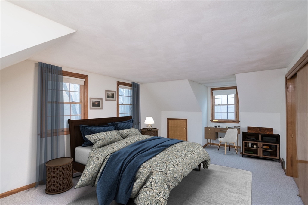 88 Buffam Road Pelham, MA 01002 - Photo 24 of 42 a bedroom with a bed and dresser with chair