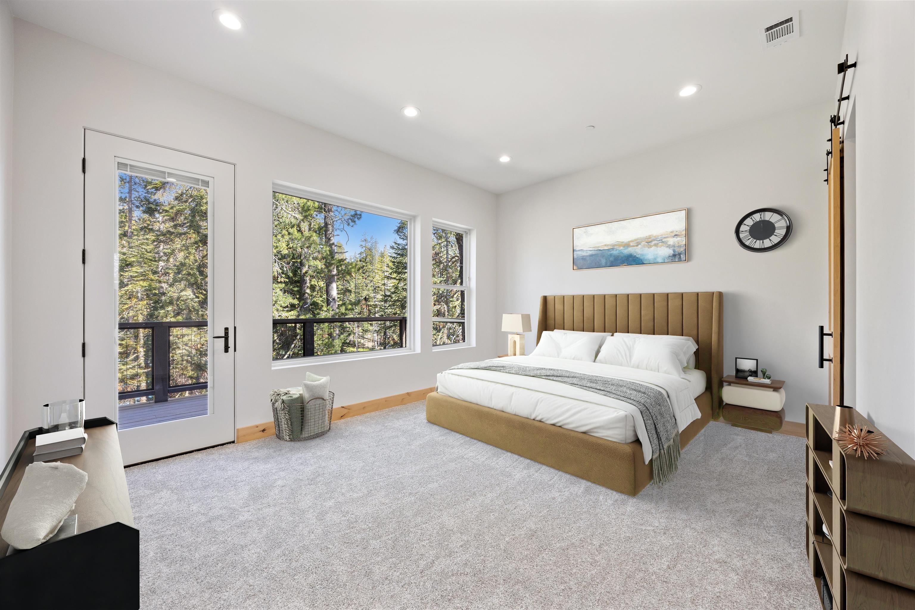 7350 Cascade Road Soda Springs, CA 95728 - Photo 9 of 27 a spacious bedroom with a large bed and a large window