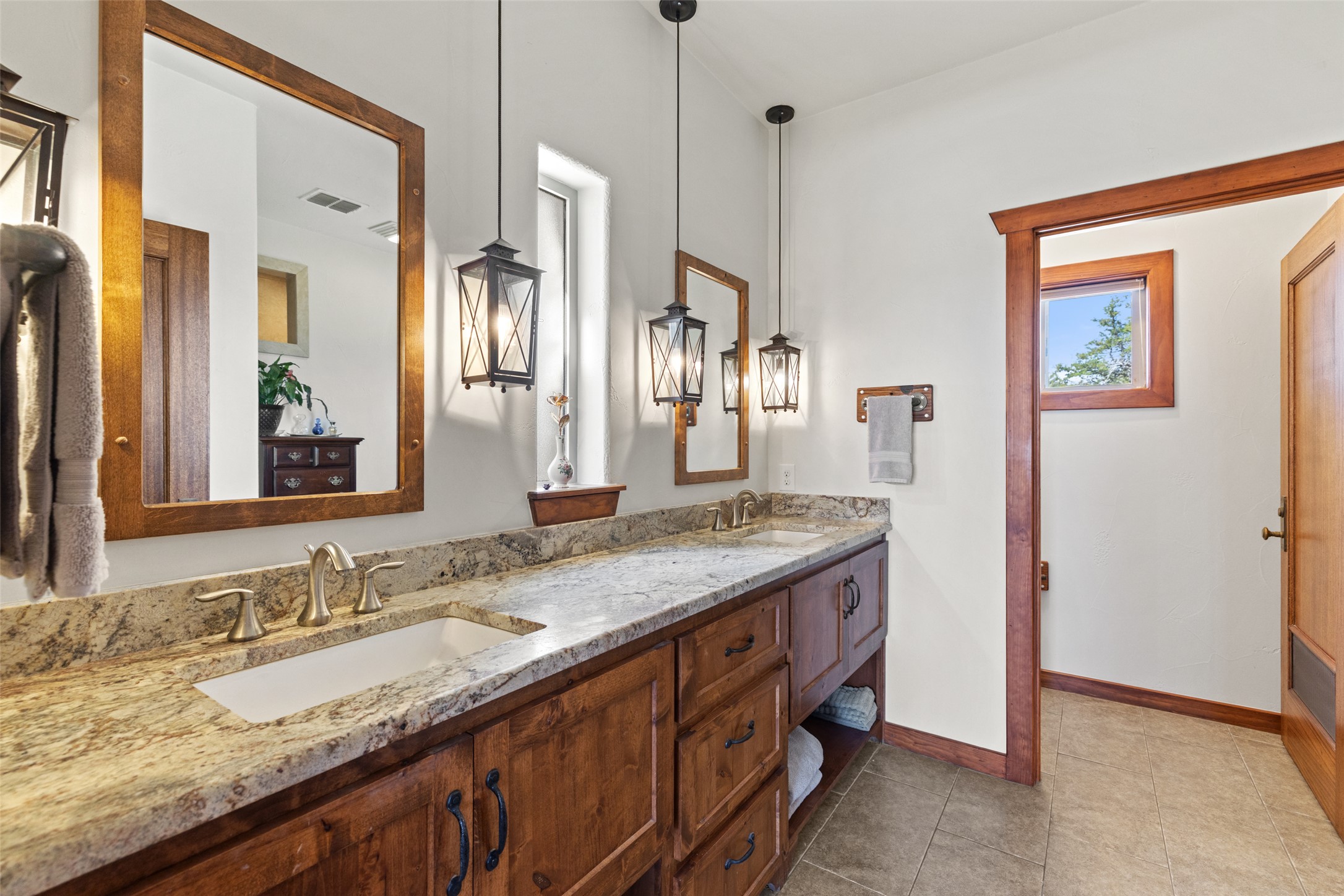 546 Lazy Oak Road Hye, TX 78635 - Photo 21 of 34 Full bathroom with double vanity and light tile patterned flooring