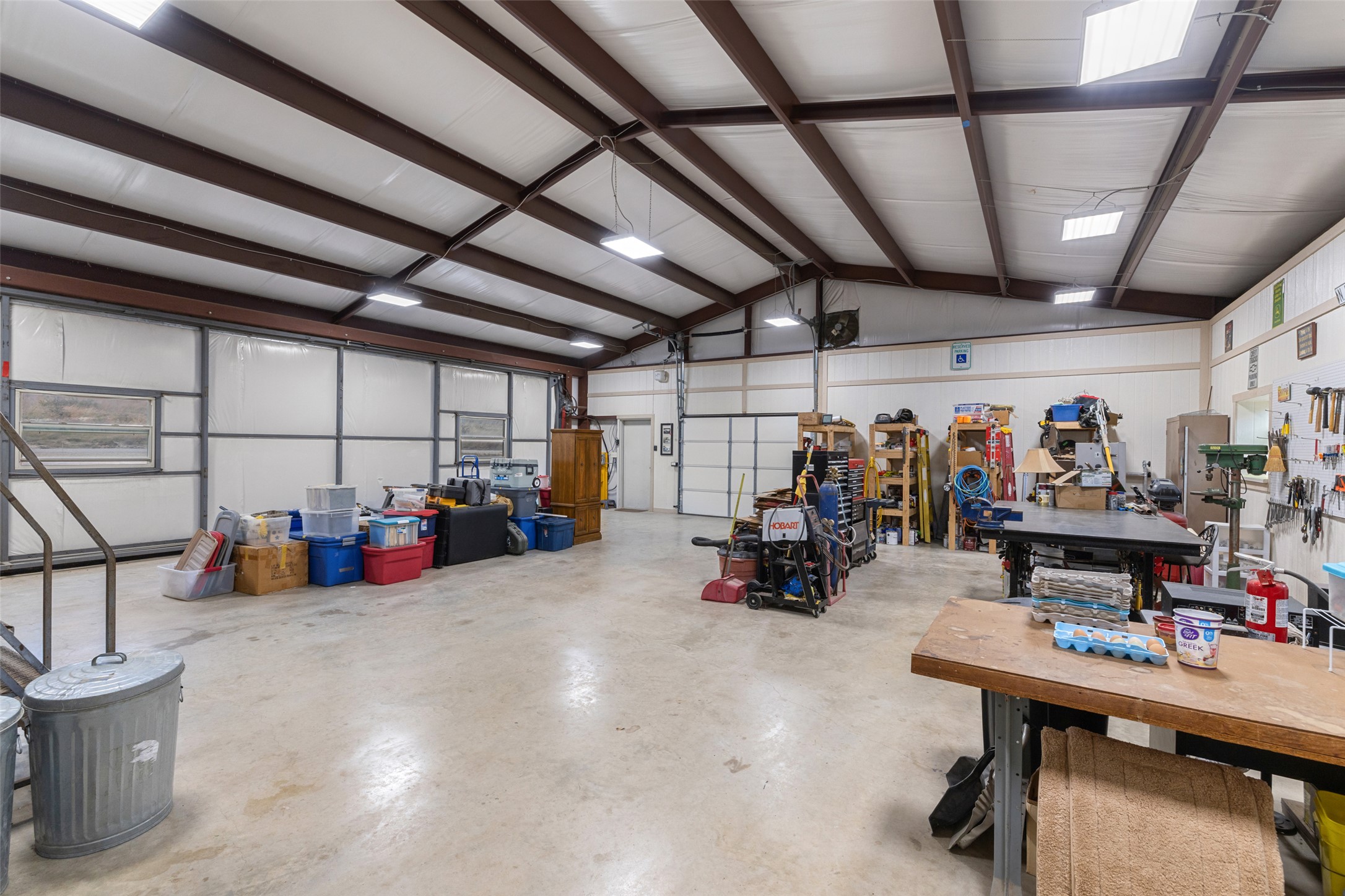 546 Lazy Oak Road Hye, TX 78635 - Photo 31 of 34 Garage featuring a workshop area