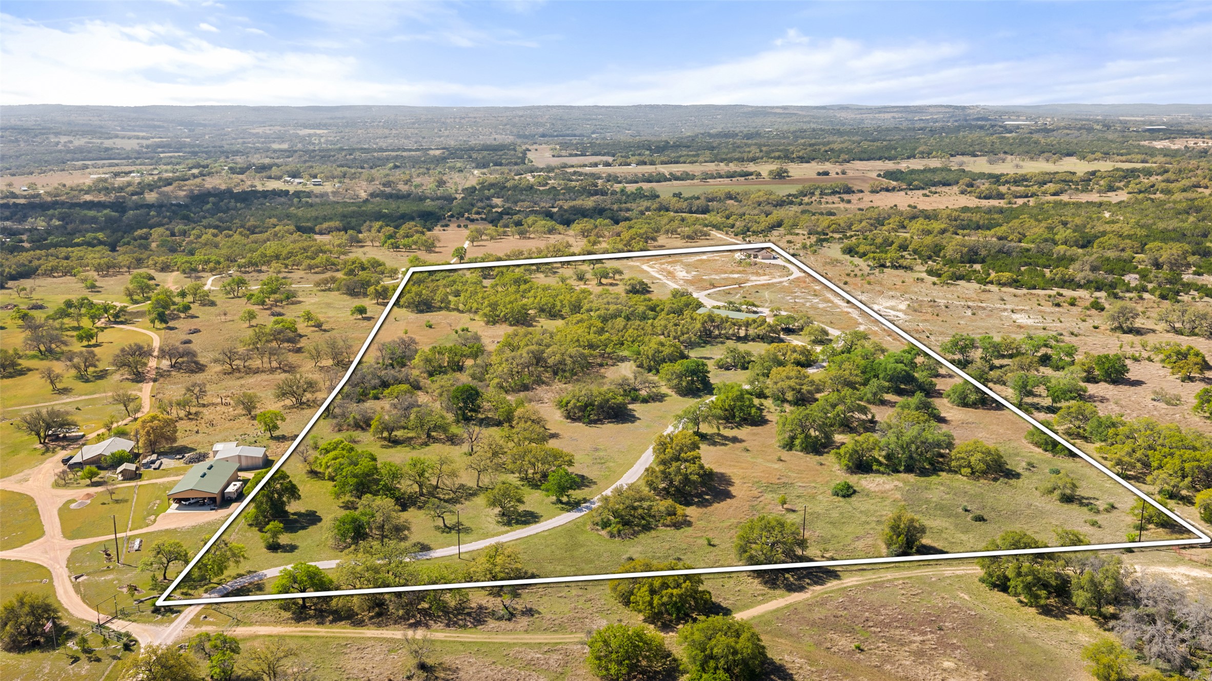 546 Lazy Oak Road Hye, TX 78635 - Photo 34 of 34 Aerial view of sparsely populated area featuring property boundaries highlighted