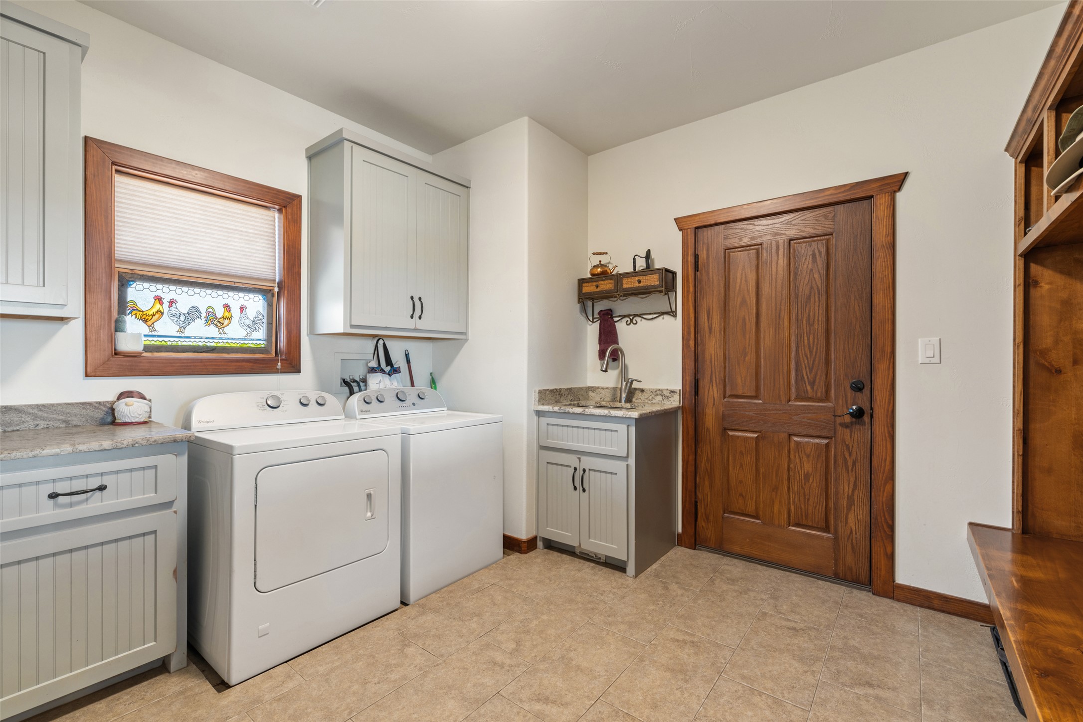 546 Lazy Oak Road Hye, TX 78635 - Photo 7 of 34 Laundry area featuring cabinet space and washer and clothes dryer